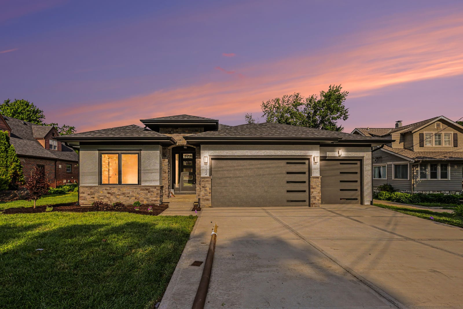 5232 Lowell St, Overland Park — front elevation at dusk