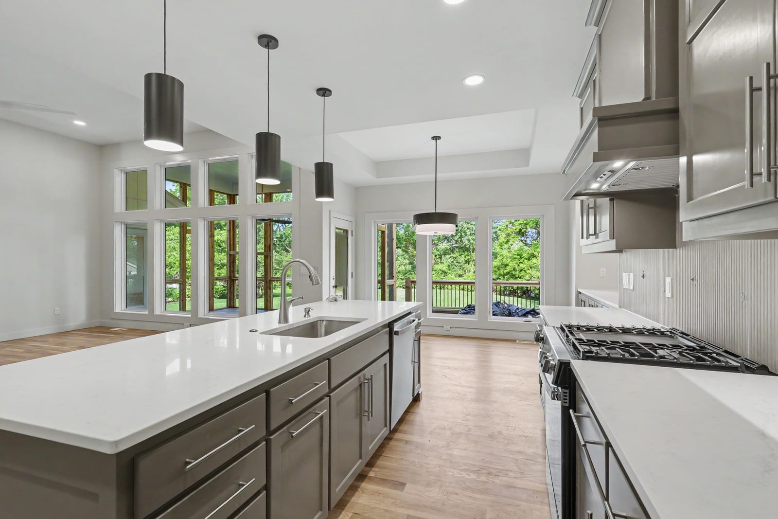 Kitchen with quartz waterfall island at 5232 Lowell St