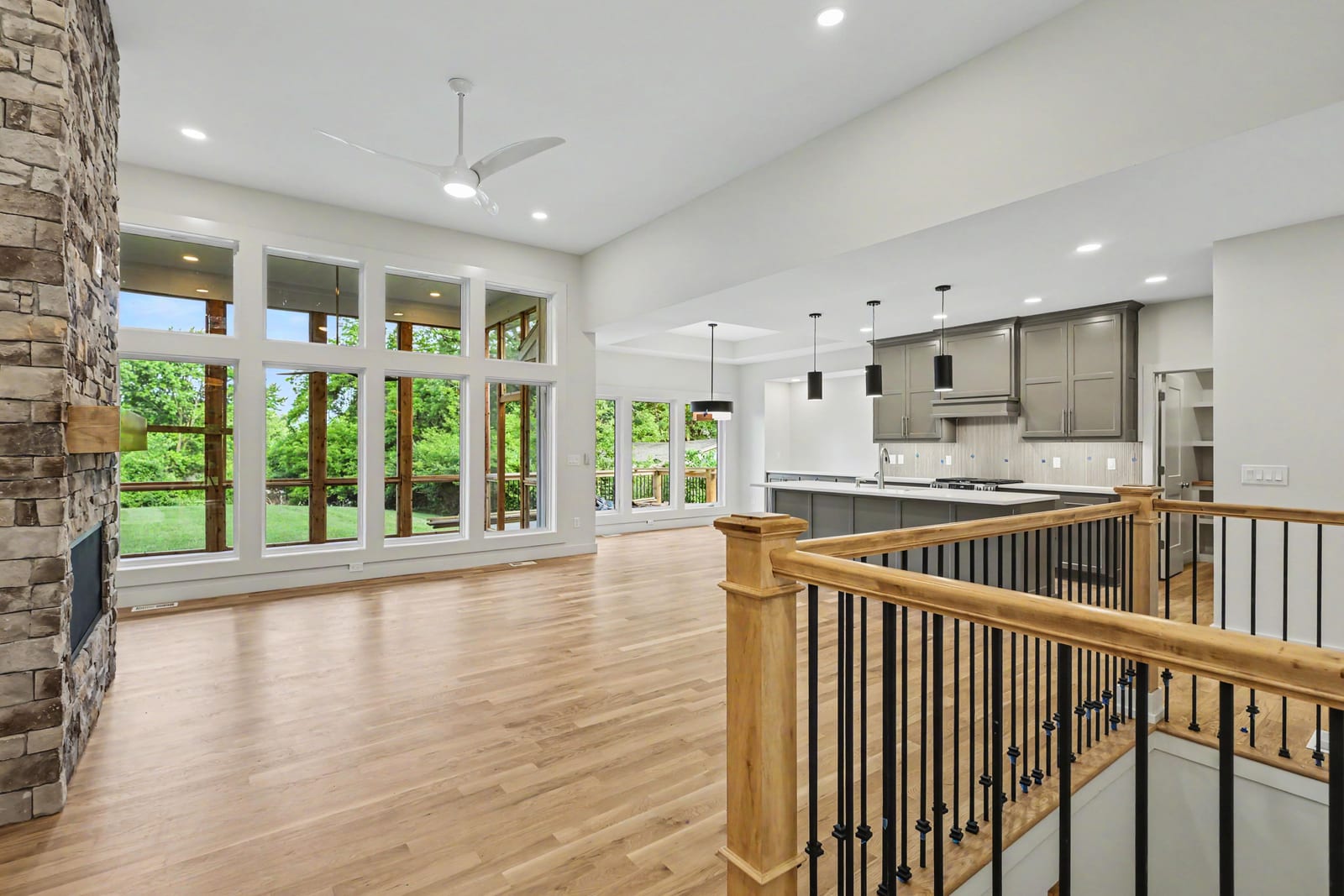 Great room with stone fireplace at 5232 Lowell St