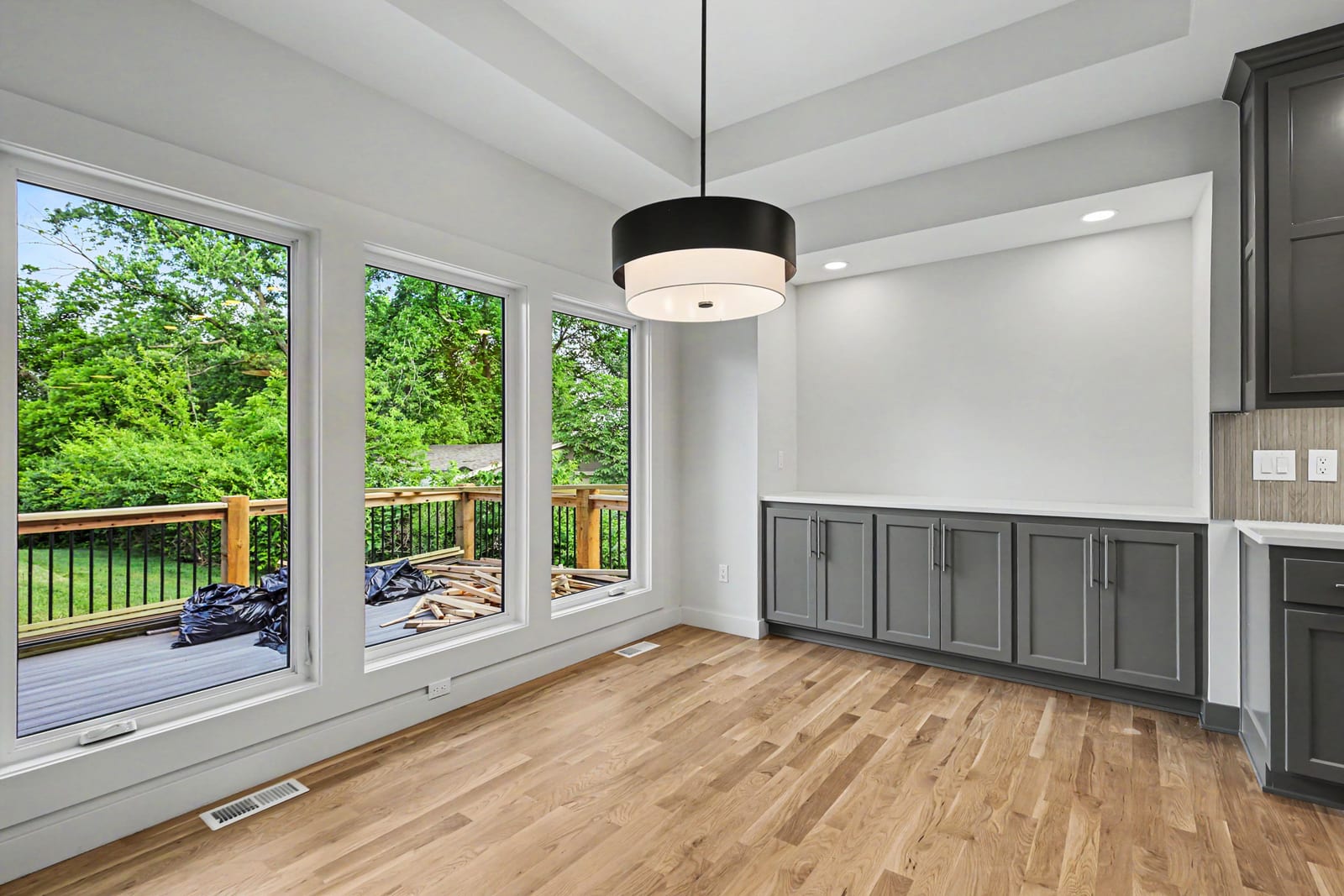 Dining area with wall of windows at 5232 Lowell St